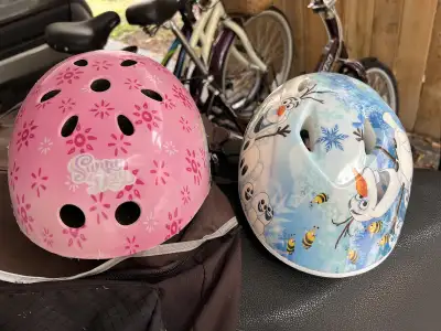 child helmet.  Pink one left, View more