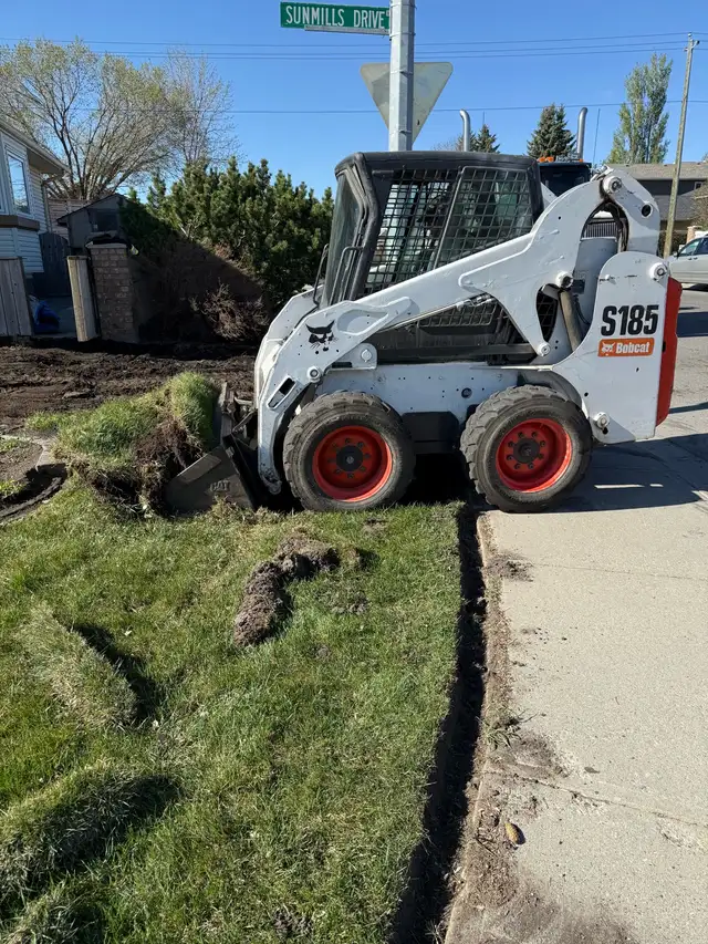  dump truck in Bobcat service 587-436-3333 630083049902111221