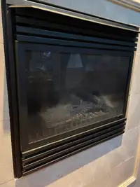 Propane gas fireplace insert auto fan blower.