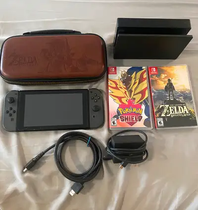 Nintendo Switch + Zelda + Pokémon Shield + Case + 128GB SD Card, View more