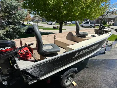 14’ Legend wide body 25hp mercury 2 stroke 75 watt motor guide Hummingbird Helix 5