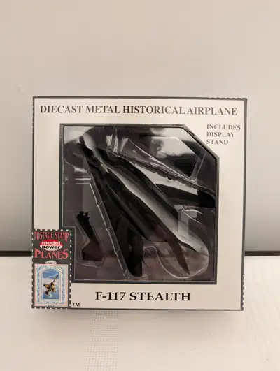The Postage Stamp Planes F-117 Stealth is a highly detailed diecast toy aircraft that would make a p...