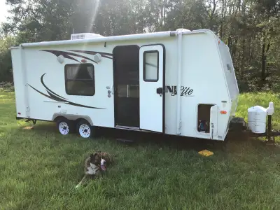 2010 Rockwood 20’ camping trailer. Camper is in great condition. Has a queen size Murphy bed in the...