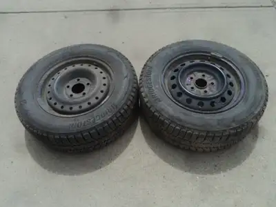 2 Bridgestone winter tires with steel rims are for sale. Tires are 205/65/15. Rims are 5 holes, 4.5...