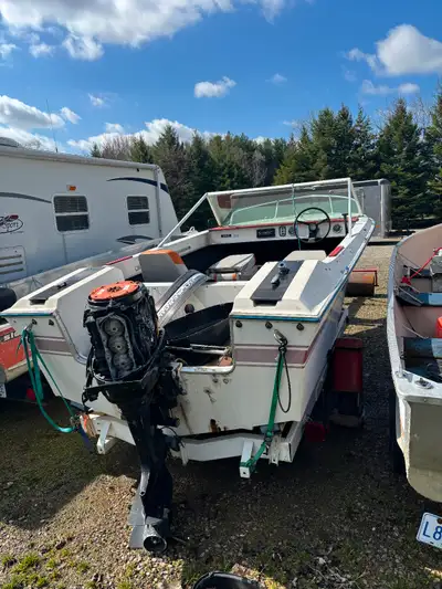 Boat trailer for sale, comes with free boat and motor. Motor does not work **BEST OFFER**