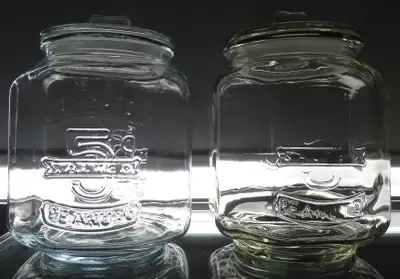 Two Glass Canister Peanut Jars, View more