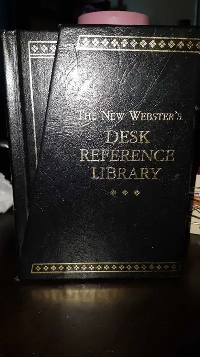 This is The New Webster's Desk Reference Library, complete with Dictionary, Thesaurus, and Concise O...