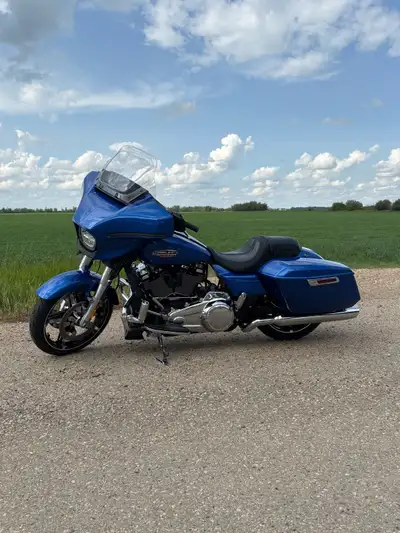 Lien free 2024 Blue Burst over chrome Street Glide. A real head turner! The Harley-Davidson Milwauke...