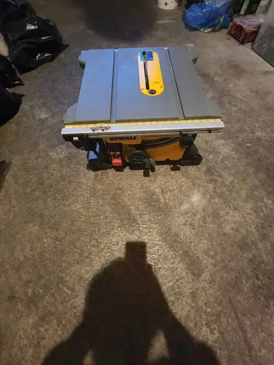 I'm selling a DeWalt table saw, great for job sites with a 15 amp motor. This saw has a 20-inch max...