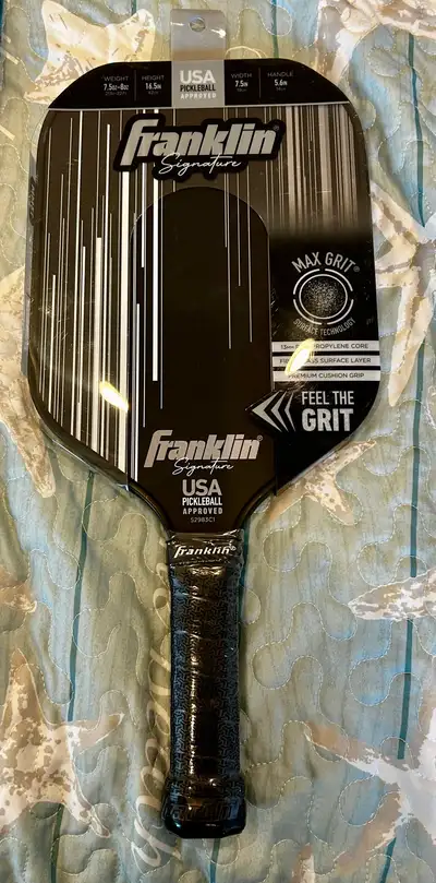 Get ready for the court with this brand new Franklin Signature pickleball paddle. This high-performa...