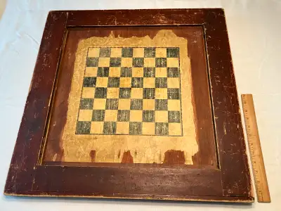 Large antique wooden checkers and crokinole board.
