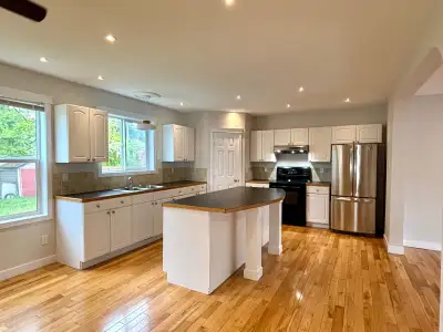 Large, ground level suite located on a quiet street in the horseshoe. With 1 Bedroom + den this spac...