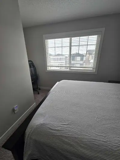 This room has it's own bathroom outside right next to it. The kitchen is being shared. There are sto...