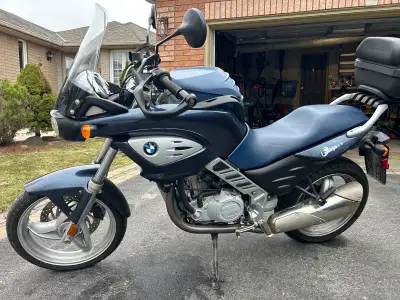 I am selling a like-new 2004 BMW F650CS motorcycle with super low (9726) kilometers, this bike is in...