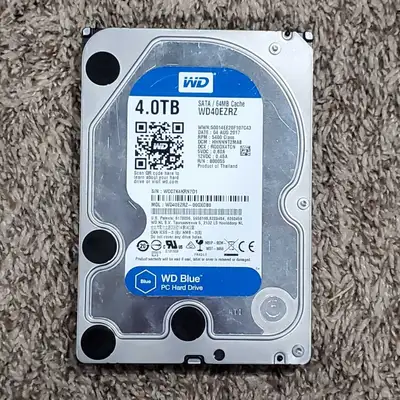 This is a used Western Digital 4TB hard drive, perfect for expanding your computer's storage capacit...
