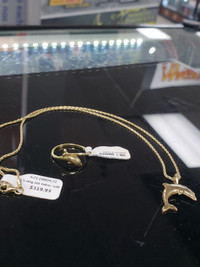 Gold dolphin ring and necklace