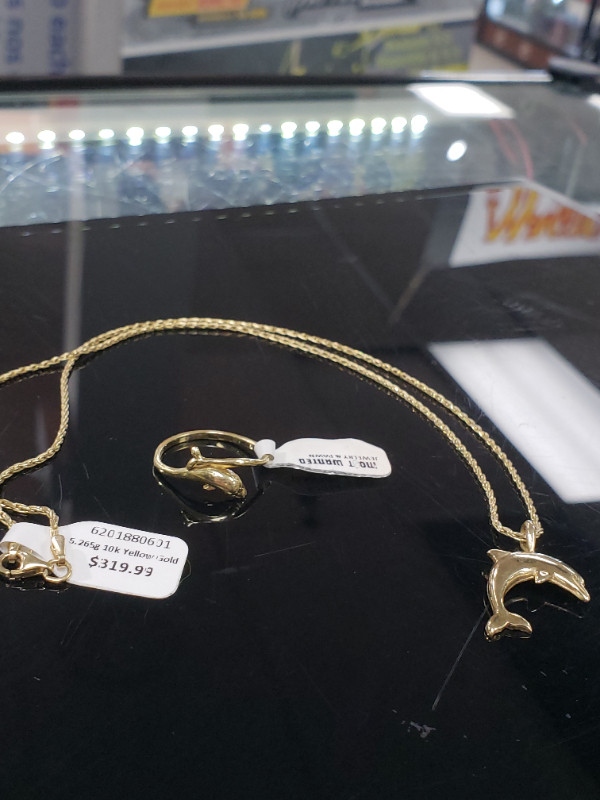 Gold dolphin ring and necklace in Jewellery & Watches in Cole Harbour