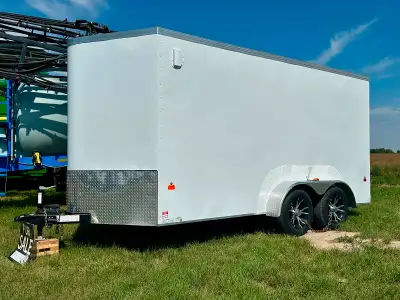 2020 Royal cargo 16’ V-Nose Tandem 3500lbs axles Ramp door 15” aftermarket wheels Interior finished,...