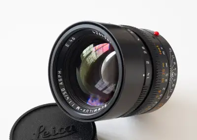 50mm Summilux (11891). This iconic lens is in pristine condition. All packaging, accessories and doc...