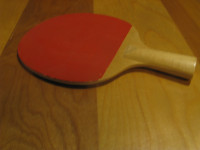 Raquette de ping pong.