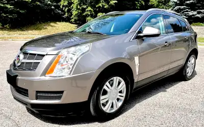 2011 Cadillac SRX, AWD, Luxury Collection, with a 6 speed automatic transmission, with manual tap-up...