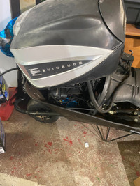 Evinrude outboard motor and fuel tank 
