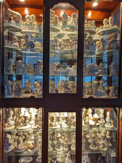 Selling a loving cared collection of 198 precious moments figurines in excellent condition, smoke fr...