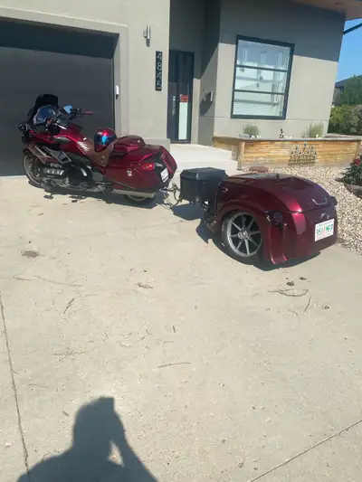 One of the best motorcycle trailers you can get. Air suspension, light and easy to pull. Google Bush...