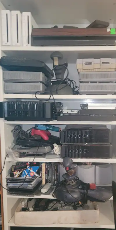 Collection of gaming consoles & controllers. from $10, View more