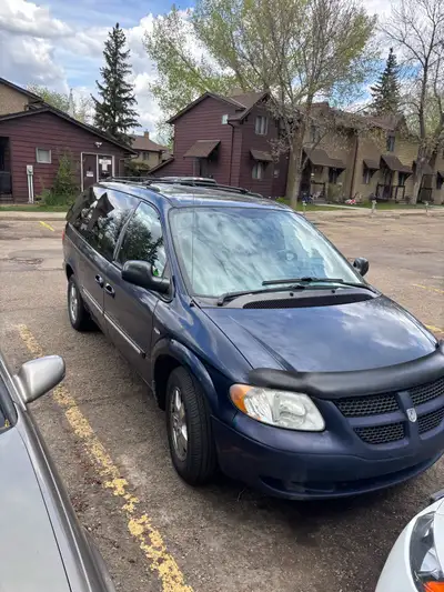 I am selling my blue Dodge Caravan, a reliable minivan with ample space and comfort, perfect for fam...