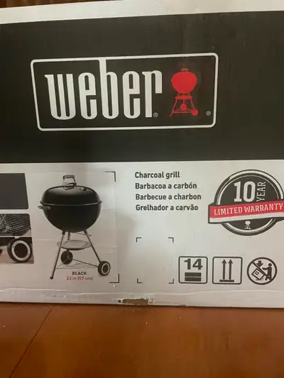 Weber charcoal BBQ never taken out of box. Sells for $199 on sale plus tax. Great Fathers Day Gift.