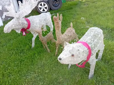 4 Christmas yard decorations $50., View more