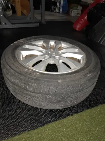 Set of 4 used tires on alloy rims in good condition. Mounted, balanced. 5x114.3 wheel bolt pattern....