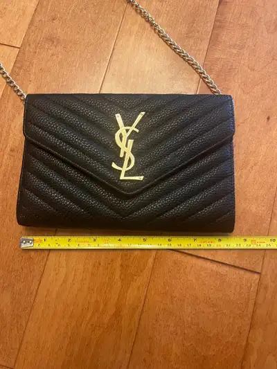 Black non leather clutch with gold detail, View more