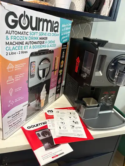 Make delicious frozen treats at home with this Gourmia Automatic Soft Serve Ice Cream and Frozen Dri...