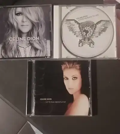 Trois cd de Céline Dion voir titre sur photos Prix 15$ pour les trois ou 7$ ch De Windsor