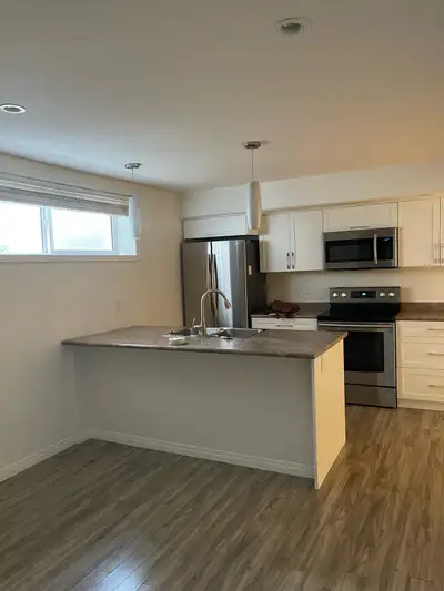 FOR RENT: 1 Bed 1 Bath LEGAL Basement Suite in Evergreen Saskatoon! Available – August 01, 2026. Wal...