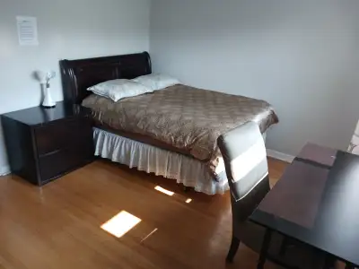 A daily private day room with its own bathroom on the house's second floor in North York. Close to P...