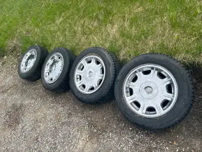 For sale are 4 winter chrome rims and tires off of a Chrysler 300. The tires are not holding air, I...