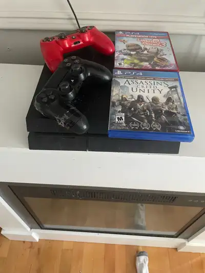 ps4 with 2 controllers and two games, View more