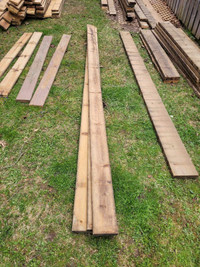 Used deck boards, 2x6s and 2x8s.