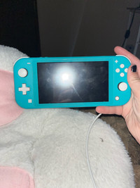 NINTENDO SWITCH LITE WITH CONTROLLER