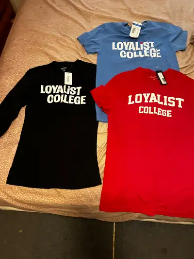 3 brand new loyalist college shirts., View more