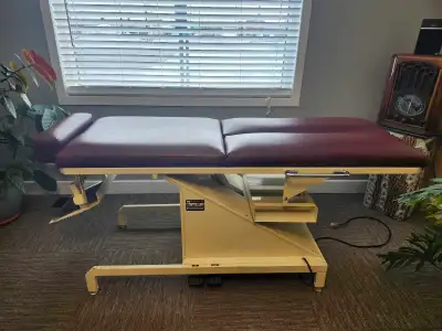 Older table, goes up for people who cannot get up. Works great and is comfortable Must pick up
