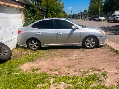 2009 Hyundai elentra sports, 4 doors low km for year, comes with 4 new tires ( not on) selling as is...