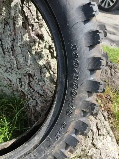 Used Geomax AT81 rear tire 110/100-18" Used Geomax MX34F front 80/100-21" Both have about 80% wear l...