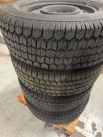 Used winter Tiger Paw tires. This is priced for the tires only. Do not know what vehicle these rims...