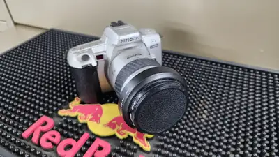 Minolta Maxxum STsi 35mm SLR Film Camera With Sigma Zoom, View more