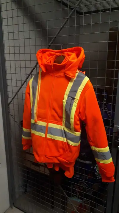 Stay visible and warm with this used hi-vis orange safety hoodie, perfect for construction, road wor...