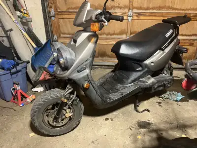 2006 Yuma 50 scooter. Street legal, just need a class 7 to run around town. Oil injection 2 stroke....